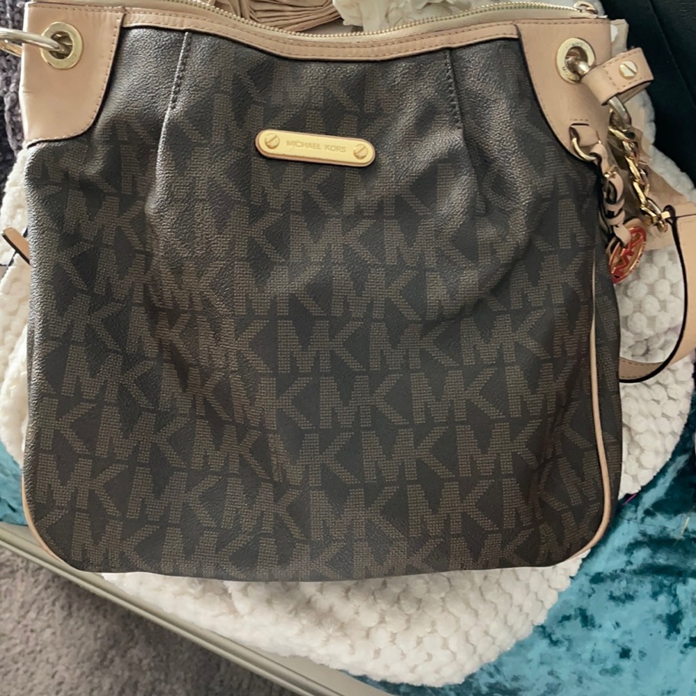 Michael kors mid sized cross body brown purse